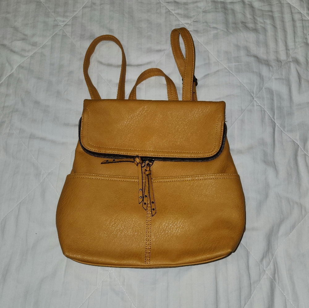 Cute mustard backpack purse never used